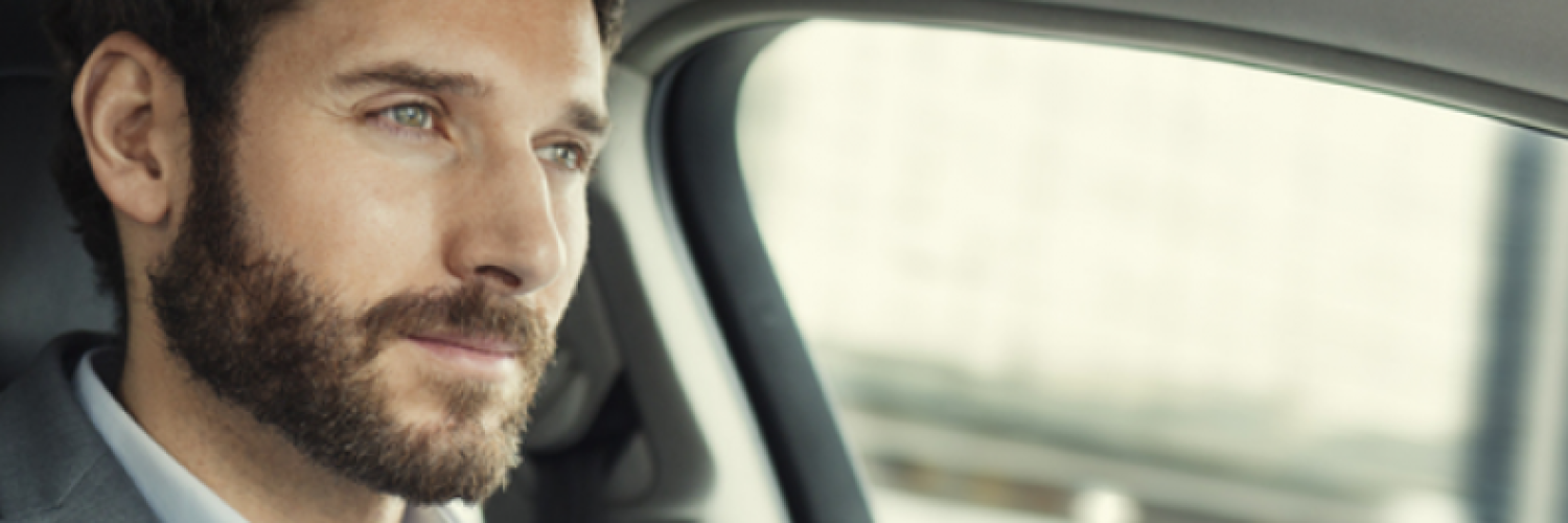 Man in a car driving Man in a car driving